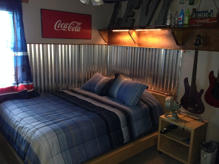 Teen Boy Room: industrial, corrugated steel wainscoting, coke, signs, copper rail, bottle collection